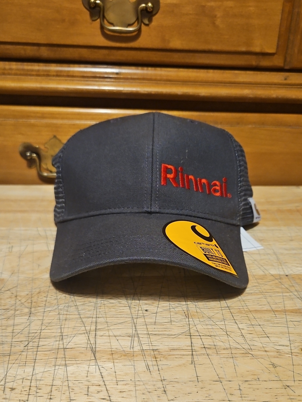Carhartt Dark Gray Trucker Cap with Red Rinnai Logo